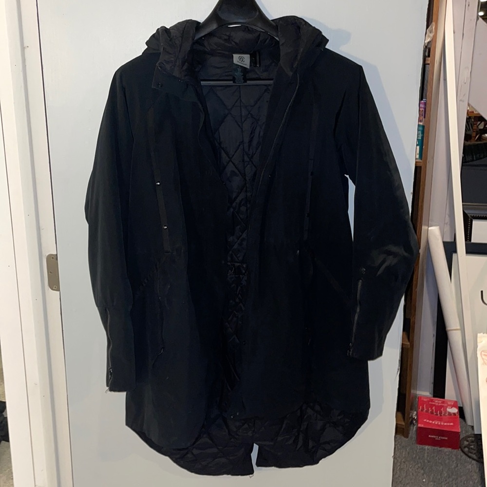 Woman’s black Champion winter coat